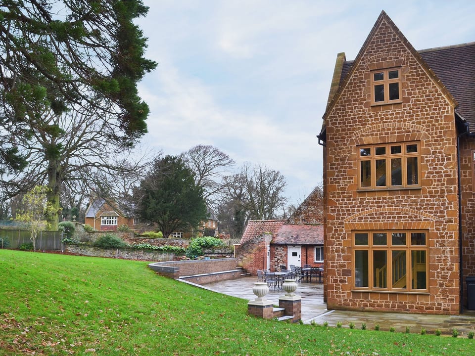 Large shared garden and furnished patio | The Pump House, Old Hunstanton, near Hunstanton