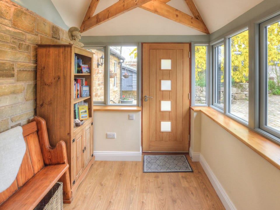 Main entrance porch with exposed beams | Hadrian&rsquo;s Garden Villa, Henshaw, near Haltwhistle