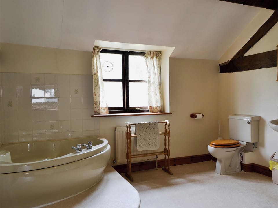 Large bathroom with corner bath and seperate shower | Halford Big Barn, Craven Arms