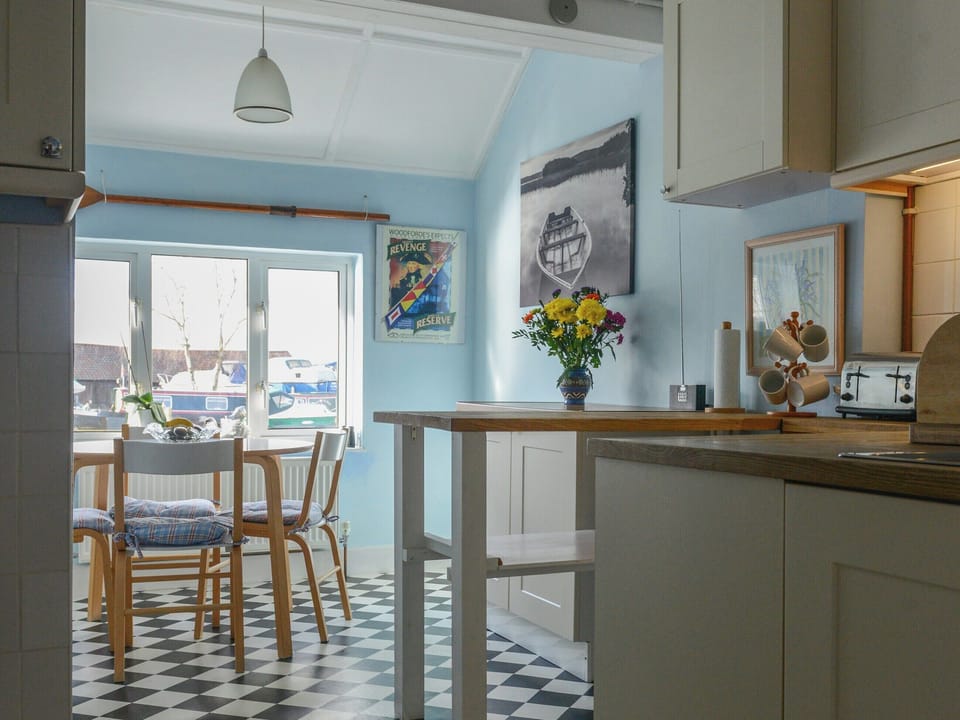 Light and airy kitchen and with informal dining area | Riverside House, Beccles