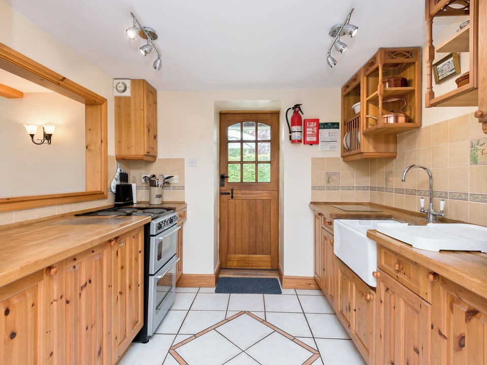 Kitchen with belfast sink | Coach House, Wareham