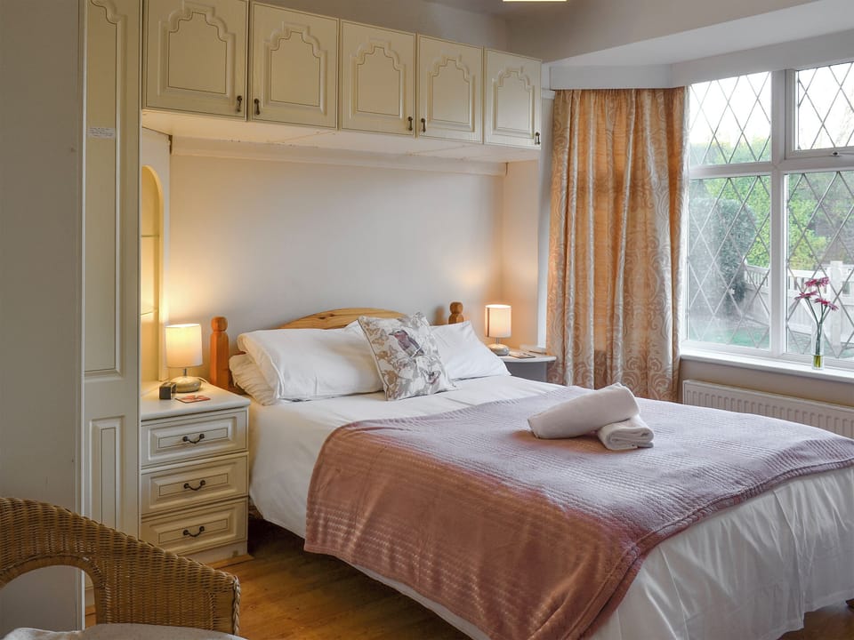 Peaceful double bedroom with ample built-in storage | The Glade, Ferring, Worthing