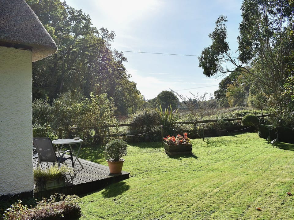 Lawned garden with charming rural views | Heathfield Lodge, Bransgore, near Christchurch