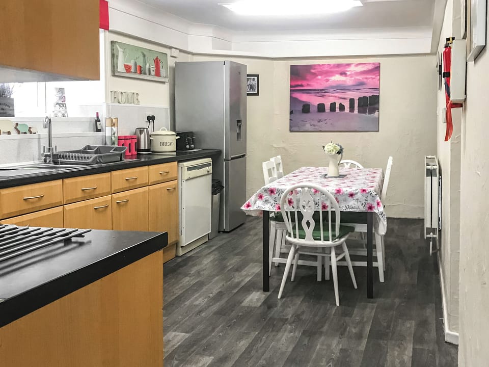 Informal dining area within kitchen | Bryn Euryn Cottage, Rhos-on-Sea, near Colwyn Bay
