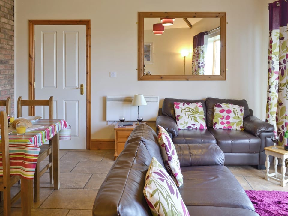 Light and airy open-plan living room, dining room and kitchen | Hampshire Cottage - Filey Holiday Cottages, Filey
