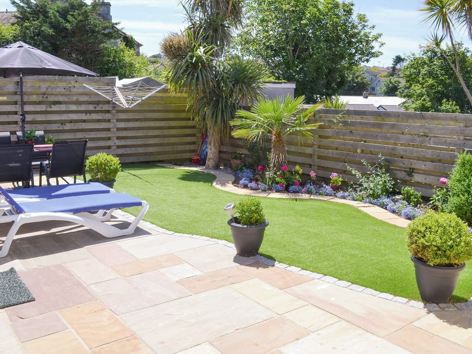 Attractive garden area | Palm Villa, Porth, near Newquay