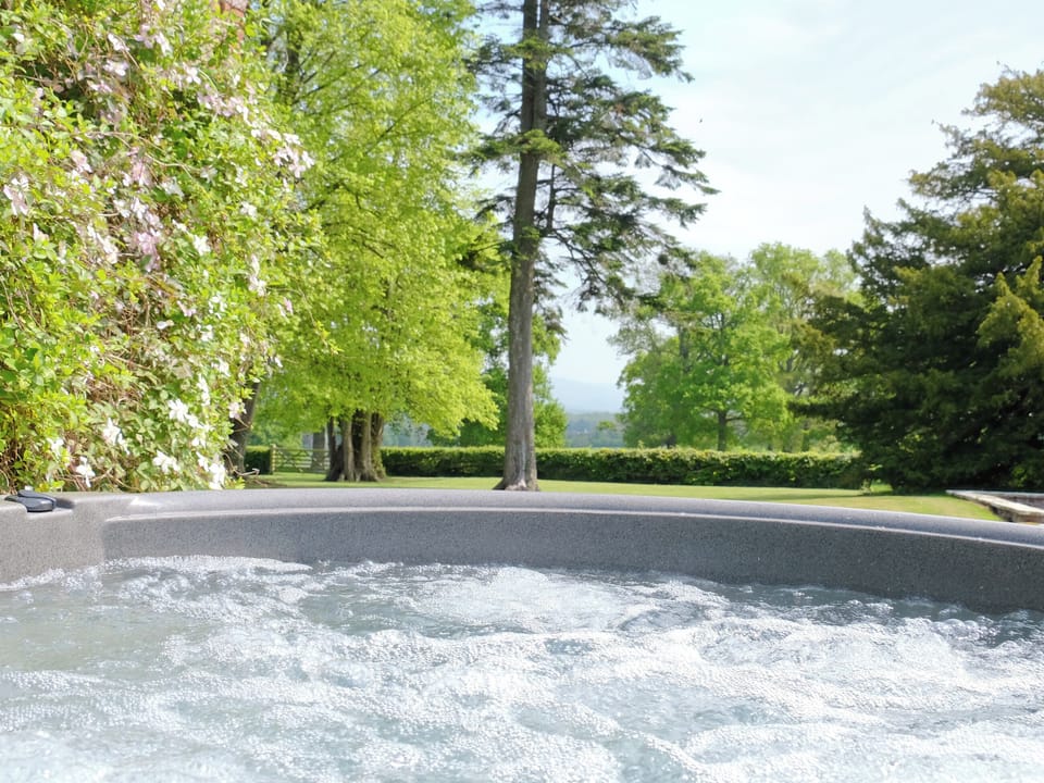 Relaxing hot tub in scenic setting | Summer House, St Asaph