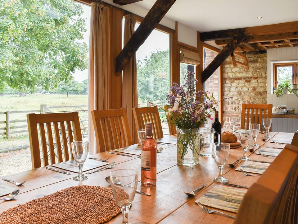 Beamed dining room with wonderful views | The Granary, Oxborough