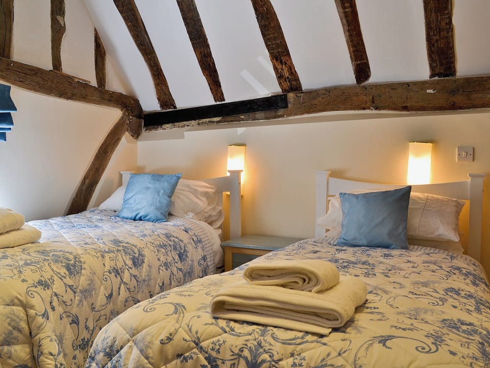 Twin bedroom | Walnut Cottage, Sproughton