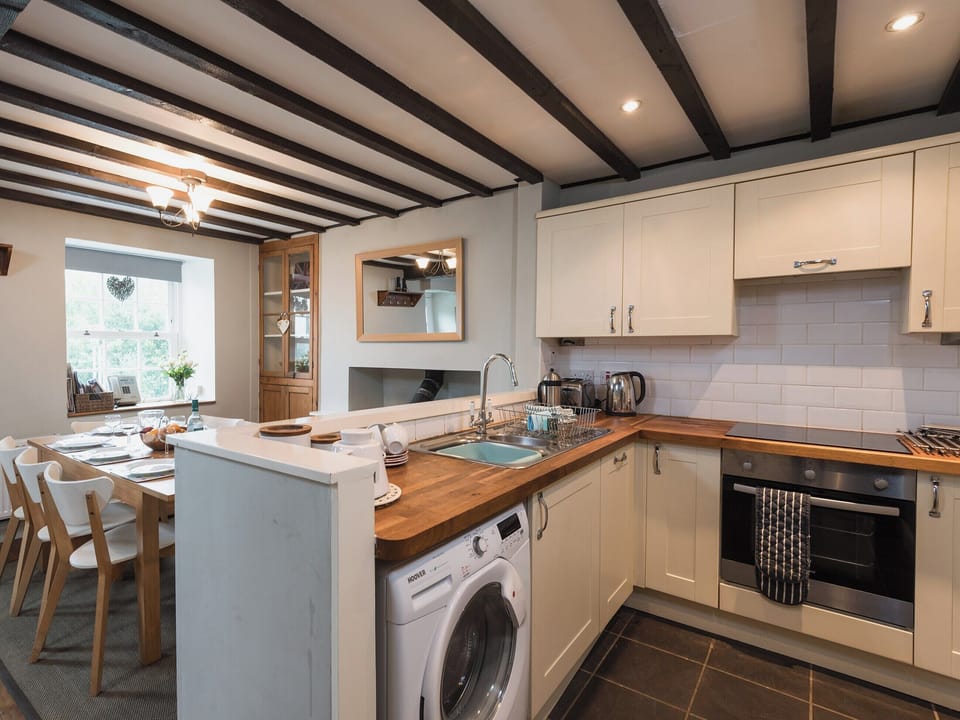 Kitchen/diner with wood burner | Old Tan Rhiw, Beddgelert