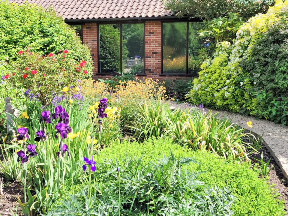 View from swimming pool. | Riverside Cottage, Old Costessey
