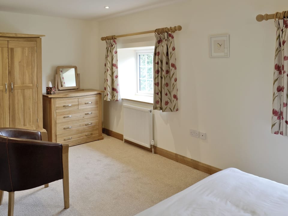 Large dressing area in master bedroom | Herons&rsquo; Weir - Jeffries Mill Cottages, Spring Gardens, Frome