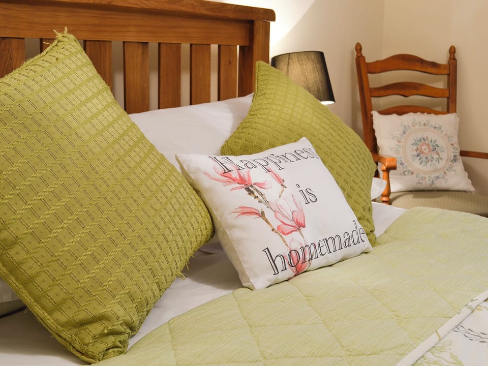 Homely touches in the master bedroom | Ty Hir - Bwlchgwyn Equestrian Holidays, Arthog, near Fairbourne