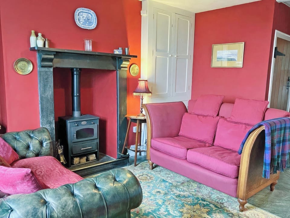 Elegant sofa in the comfortable sitting room | Downhouse Cottage - Downhouse Cottages, Trebarwith, near Delabole