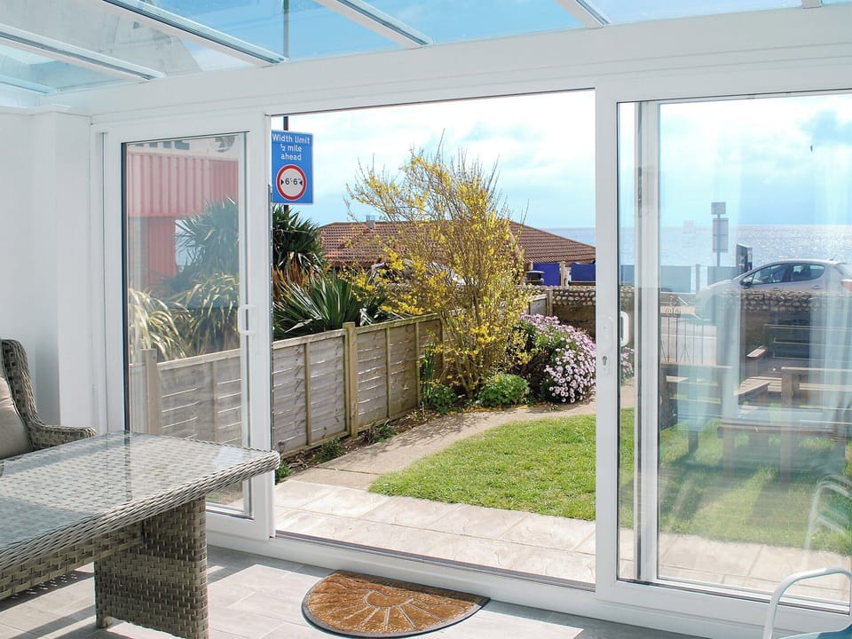 Wonderful sea views from the conservatory | Shoreline Cottage, Sandown