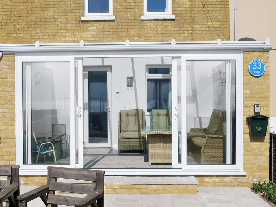 Holiday property with conservatory | Shoreline Cottage, Sandown