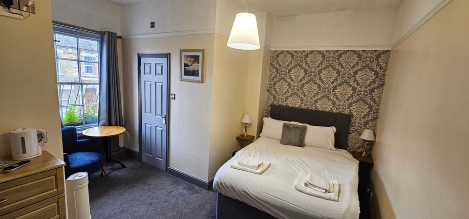 Desk, free WiFi, bed sheets