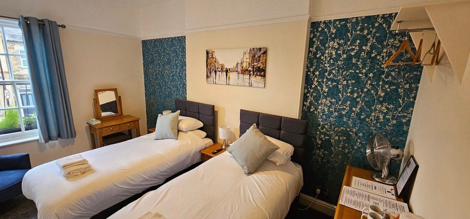 Desk, free WiFi, bed sheets