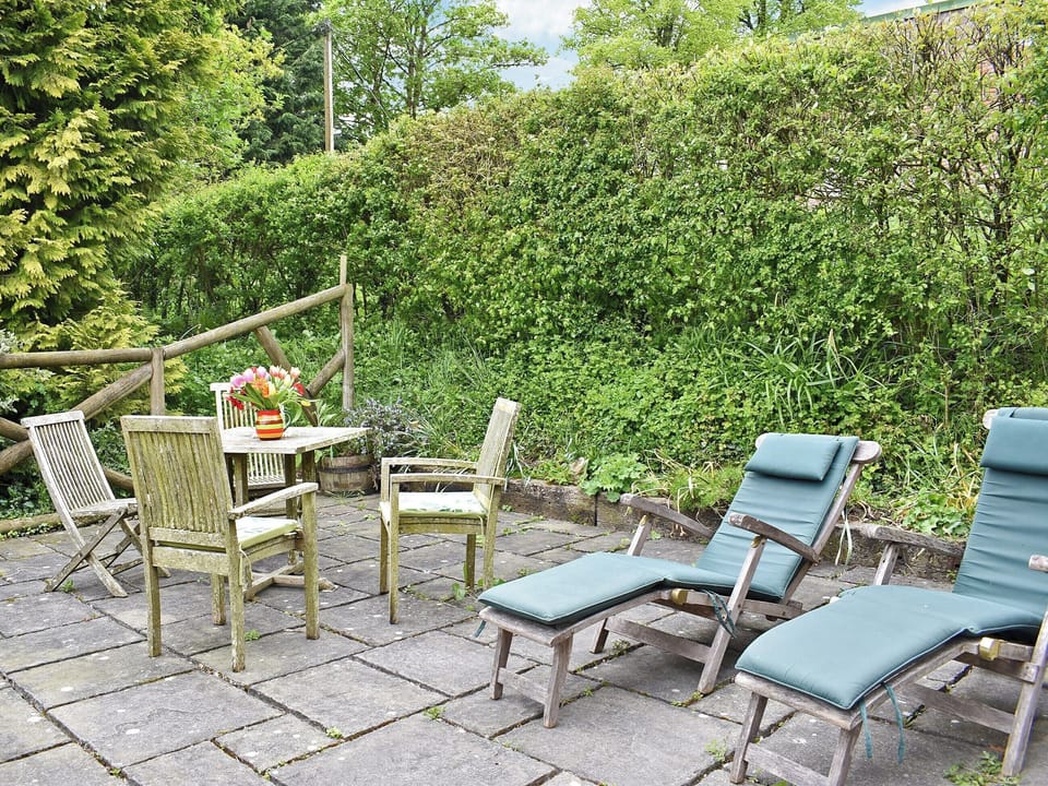 Peaceful garden with terrace and furniture | The Old Forge, Lower Wraxall, near Dorchester