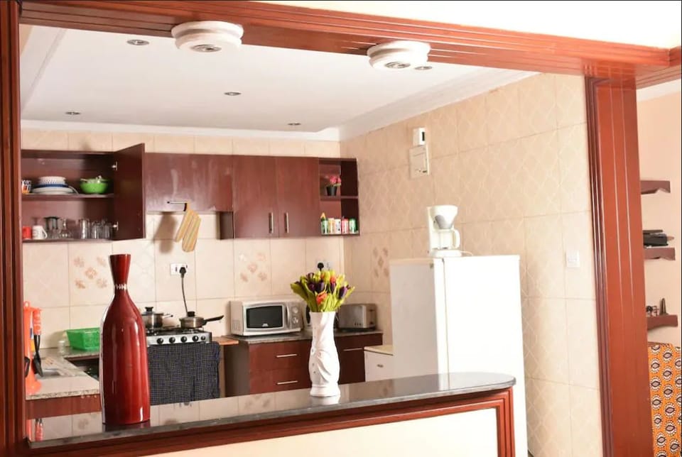 Apartment, 1 Double Bed, Non Smoking | Private kitchen | Full-size fridge, microwave, oven, stovetop