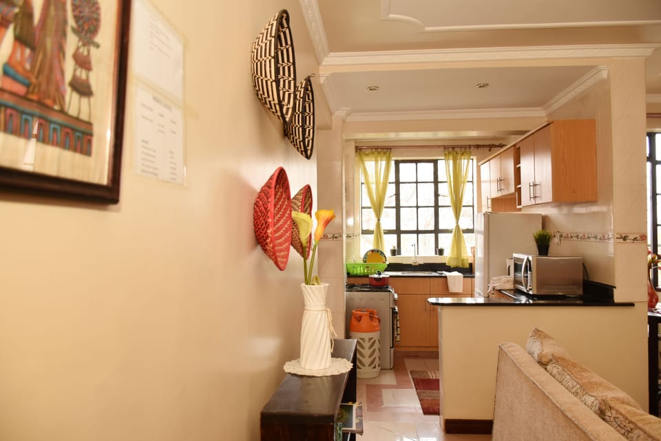 Apartment, 1 Double Bed, Non Smoking | Private kitchen | Full-size fridge, microwave, oven, stovetop