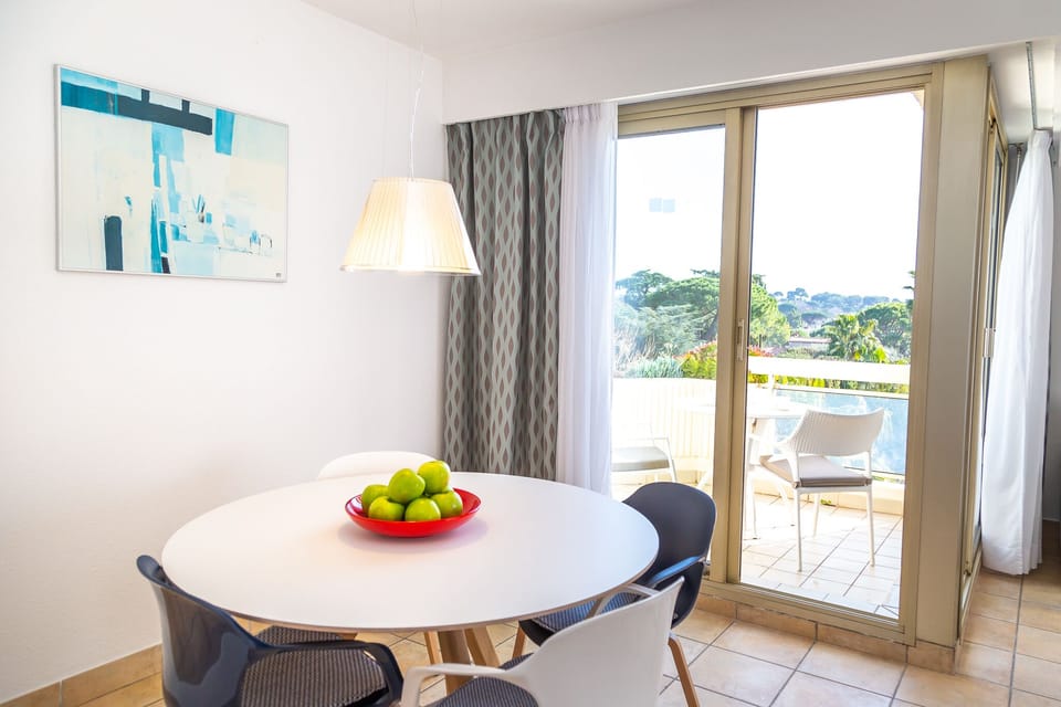 Comfort Apartment, 1 Bedroom, Sea View | Living area | Flat-screen TV