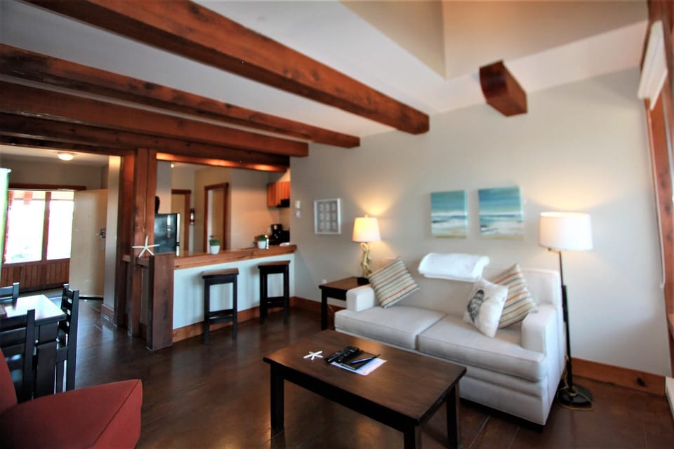 Condo, 1 Bedroom, Ocean View | Living room | Flat-screen TV, fireplace