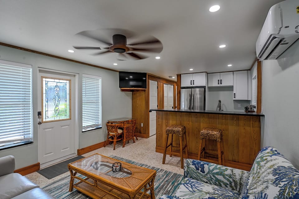 OLD-SCHOOL BEACH COTTAGE, RESTORED MODERN—KEEPING THE TERRAZZO AND CYPRESS TRIM 