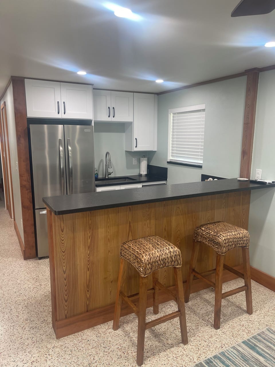 CYPRESS BAR WITH 2 CUSTOM BOHEMIAN STOOLS, LEATHERED BLACK PEARL GRANITE TOP