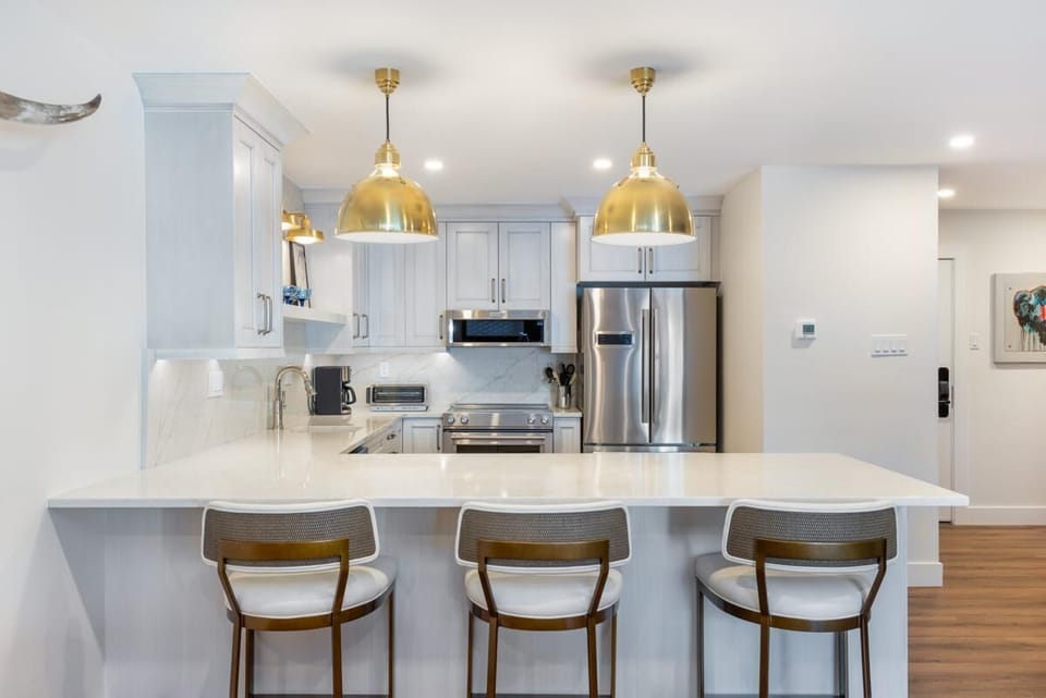Bright modern kitchen with spacious island and stylish seating
