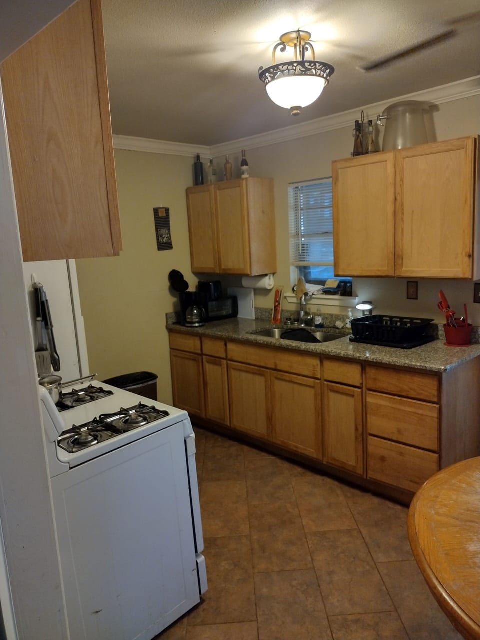 Granite countertops, dishes, cups & utensils provided.