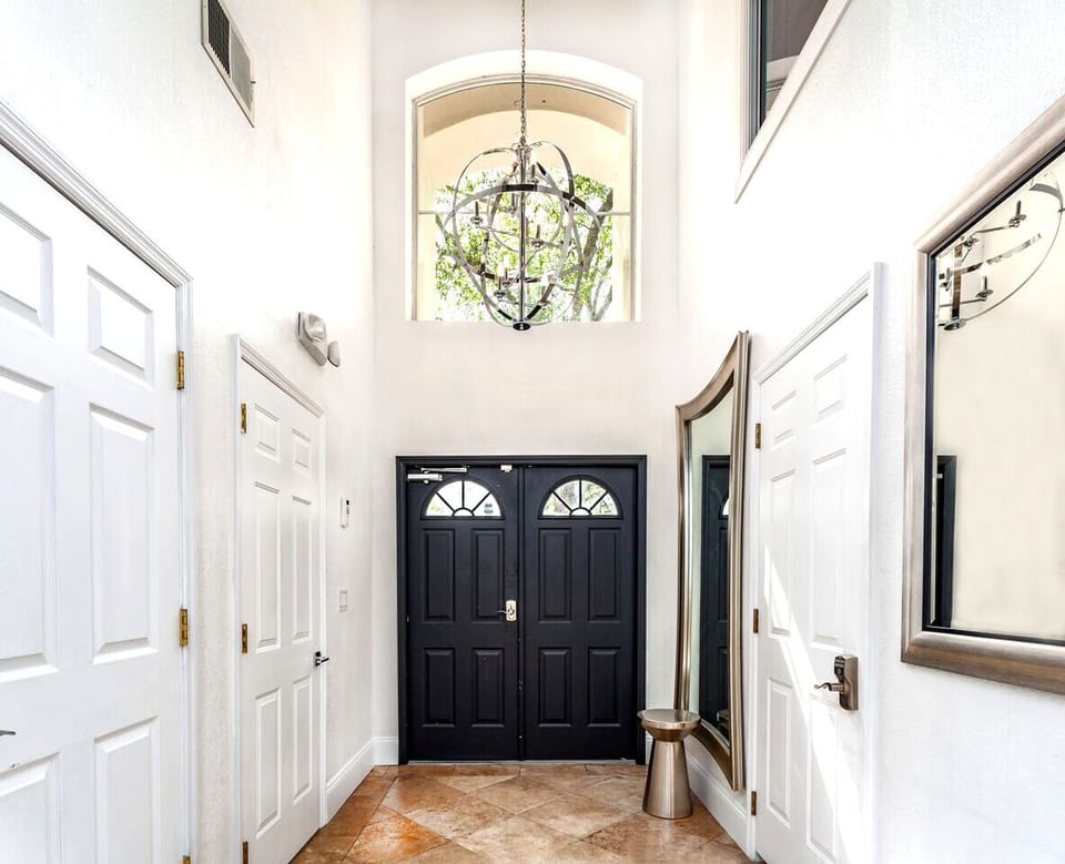 This is the interior entrance lobby our DisneyEstate overlookg the championship golf course and resort community.