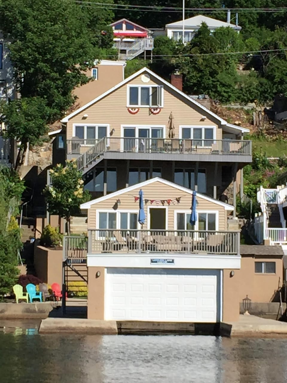 Leisure Lake Lodge as taken from the boat.  At night, 64 outdoor lights gleam.