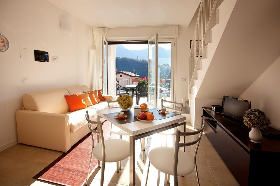 The living room opens out to your private balcony