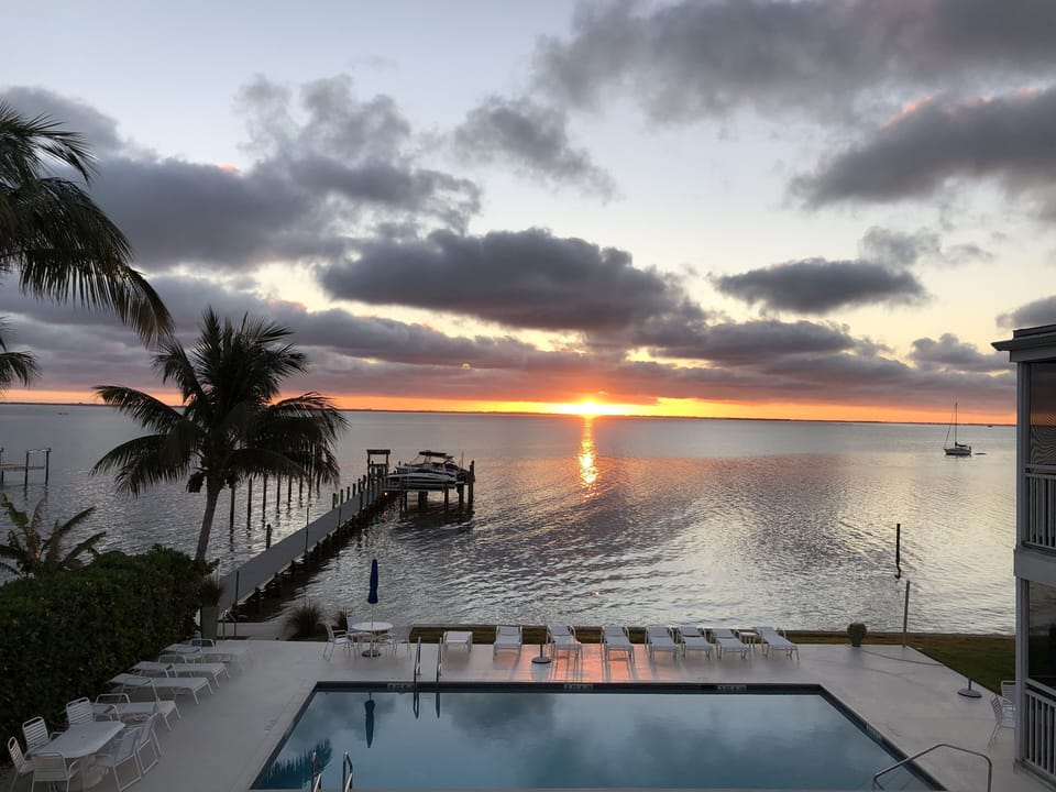 Another dramatic sunrise seen from the lanai welcomes a new day on Captiva.