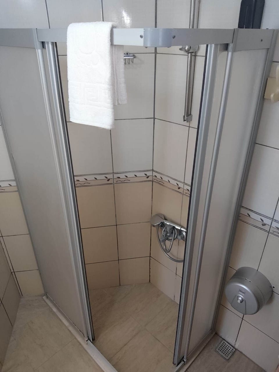 Shower, free toiletries, hair dryer, slippers