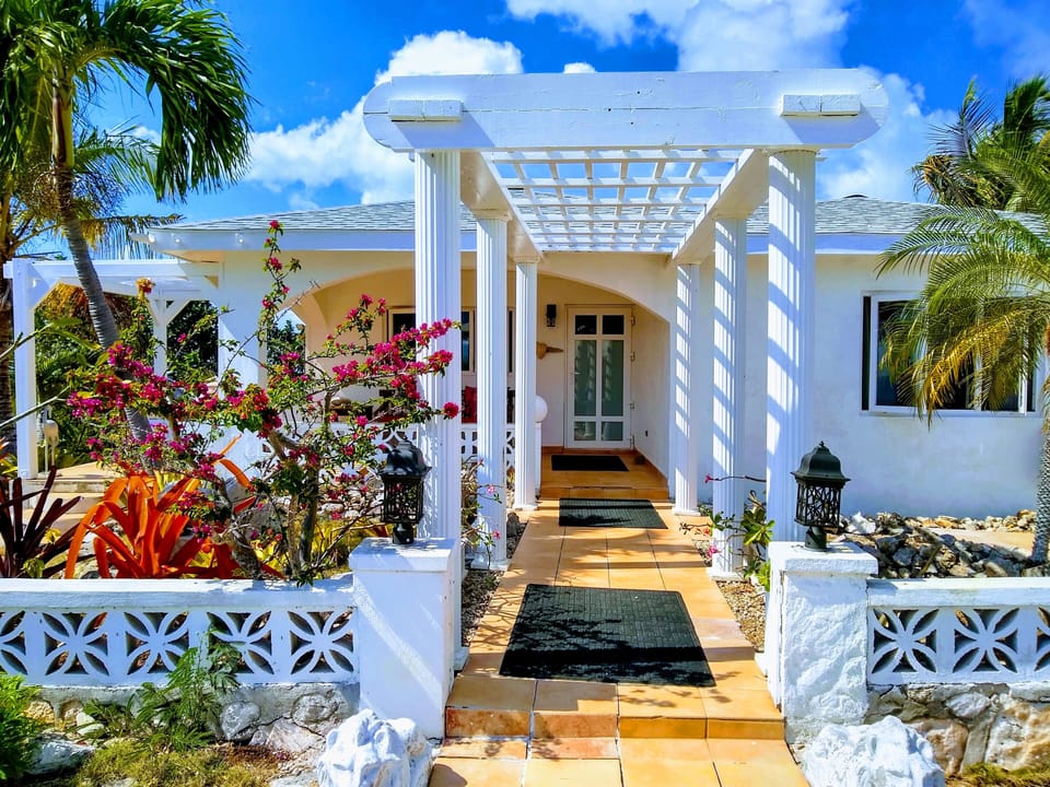 A shade pergola welcomes you to your private retreat 