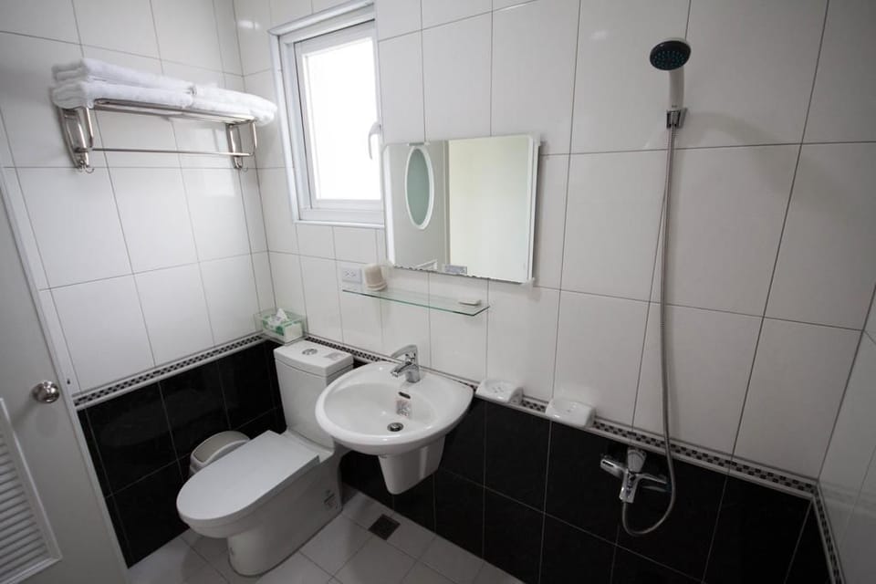 Shower, free toiletries, hair dryer, slippers