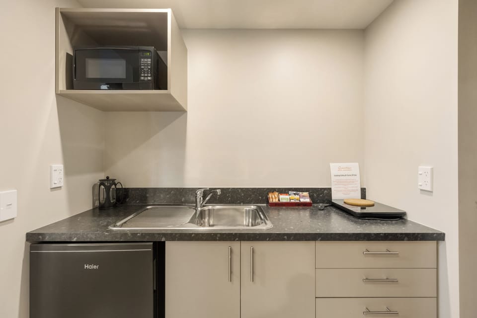 Mini-fridge, microwave, stovetop, electric kettle