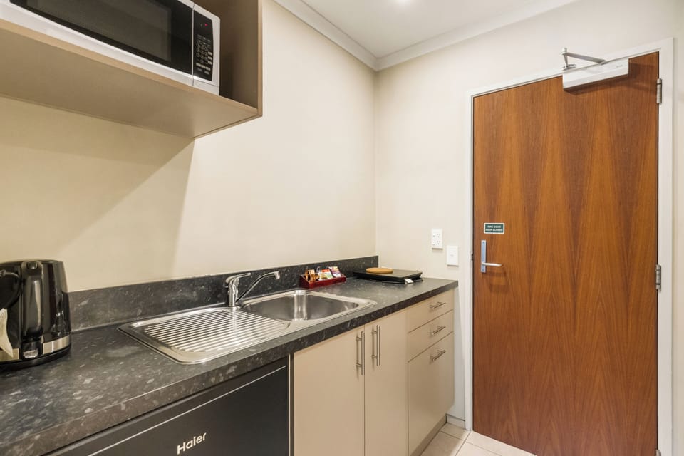 Mini-fridge, microwave, stovetop, electric kettle