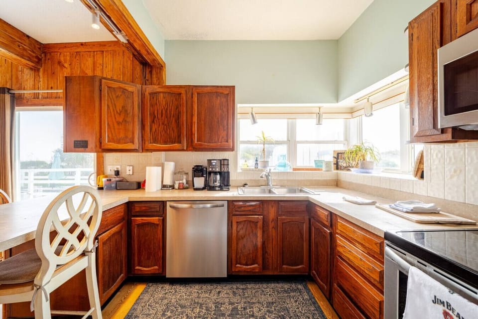 First Floor-  Fully stocked kitchen, complete with all that you will need after a long day in the sun