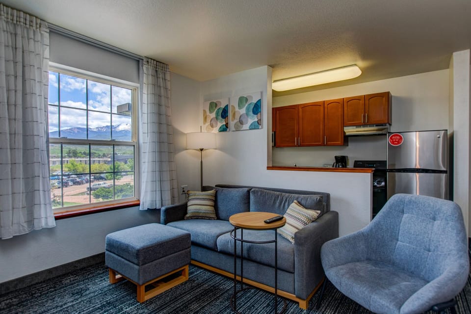 Suite, 2 Bedrooms | Living area | 32-inch LCD TV with cable channels, TV, Netflix