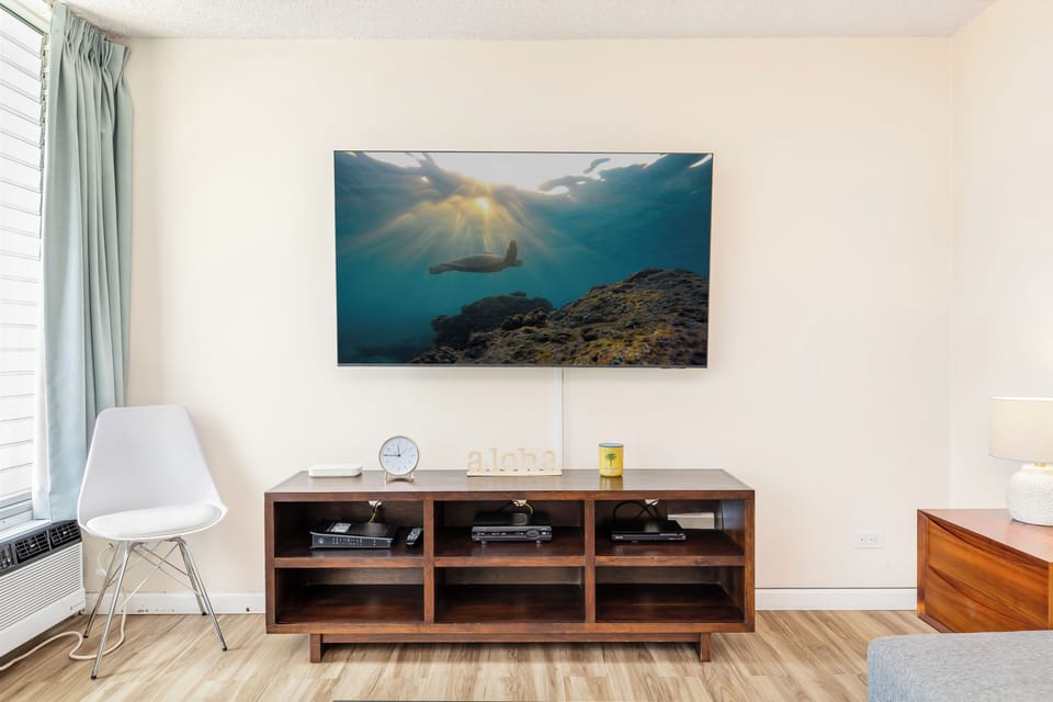 Cozy up for a perfect movie night with a flat-screen TV