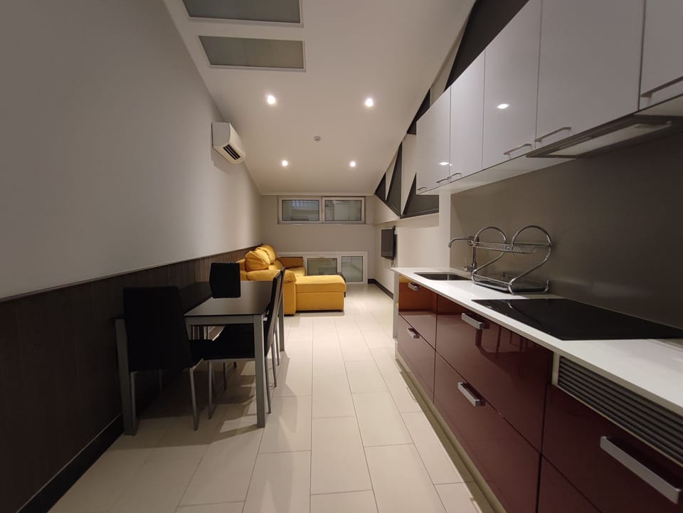Family Apartment, 1 Queen Bed with Sofa bed, Kitchen | Living area | Flat-screen TV
