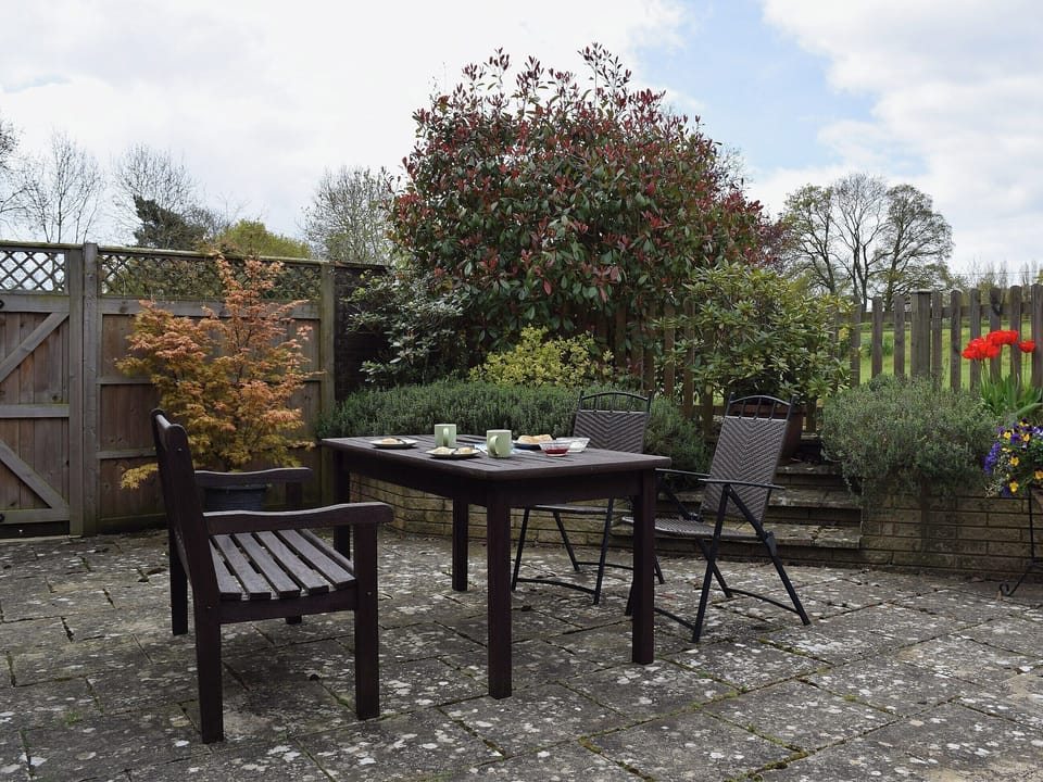 Comfortable table and chairs for outdoor entertaining | Sunrise, Kings Coughton, near Alcester