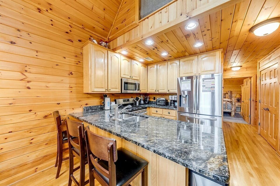 Open plan kitchen with beautiful granite counter tops