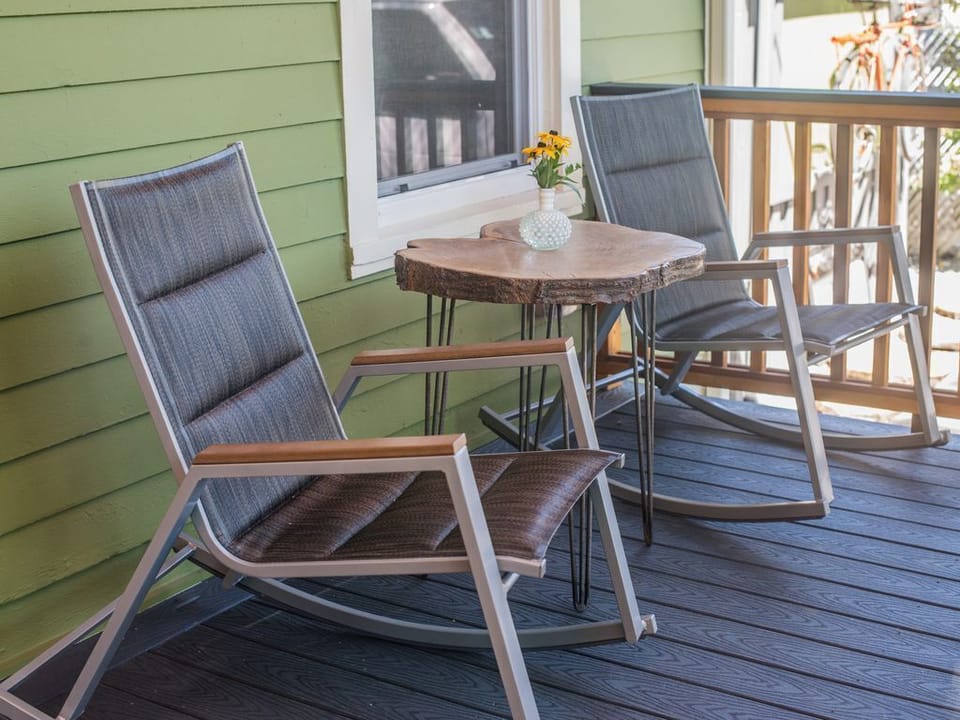 The porch is a sweet spot to hang with a cup of coffee &amp; people watch!