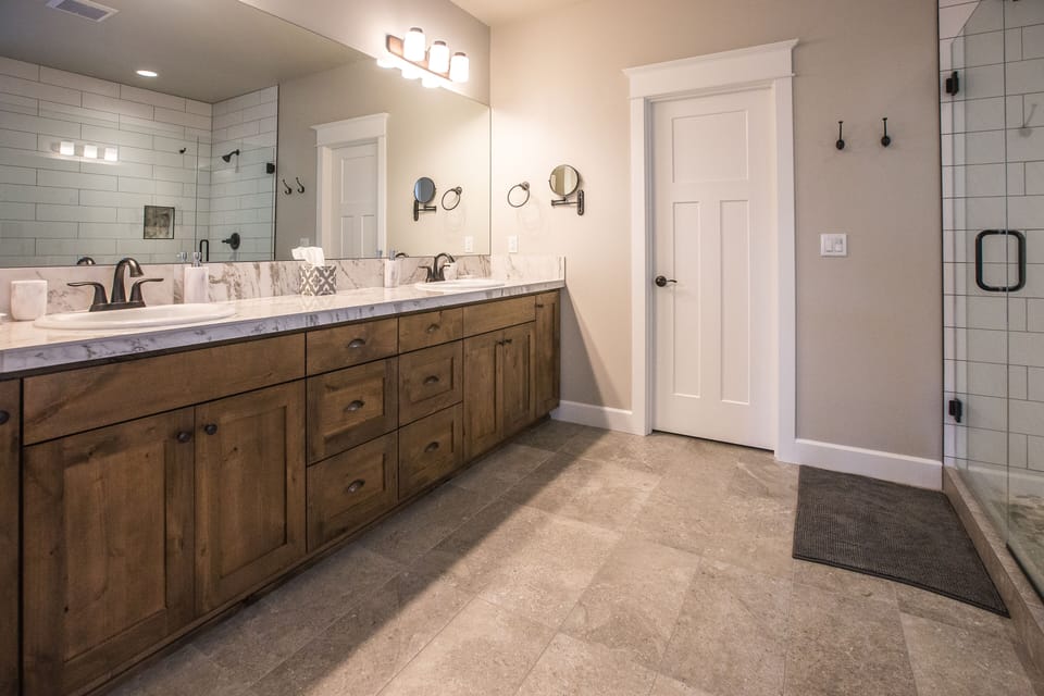 Spacious master bathroom with lots of cabinet and counter space. 