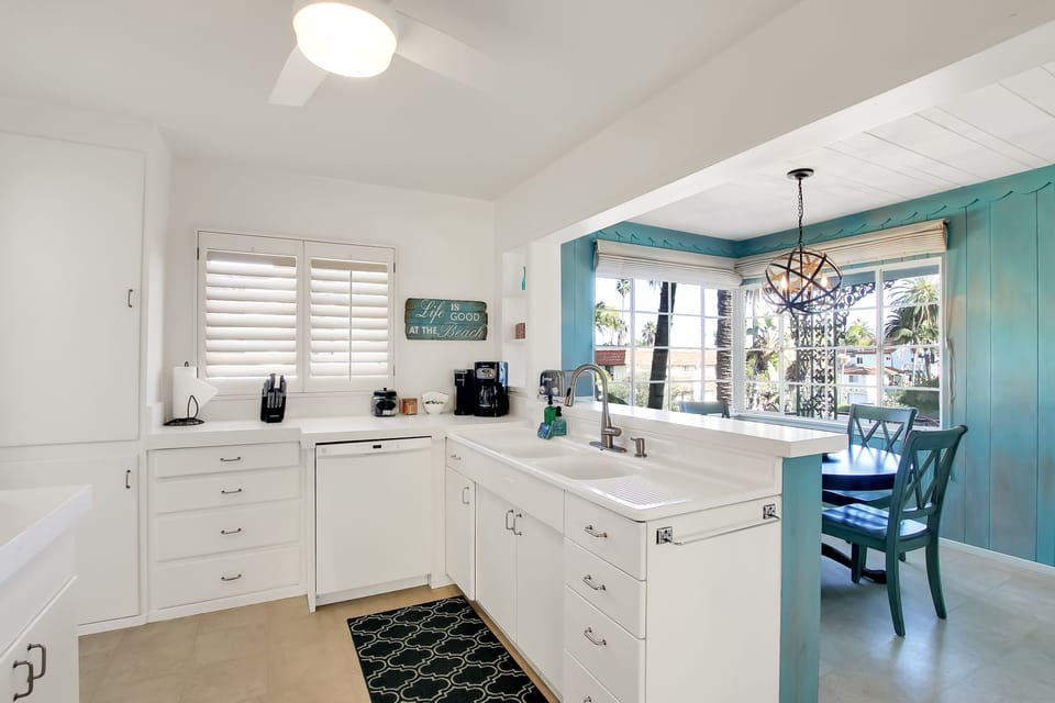 Additional seating in the kitchen plus Keurig and drip coffee maker make for a wonderful dining experience.