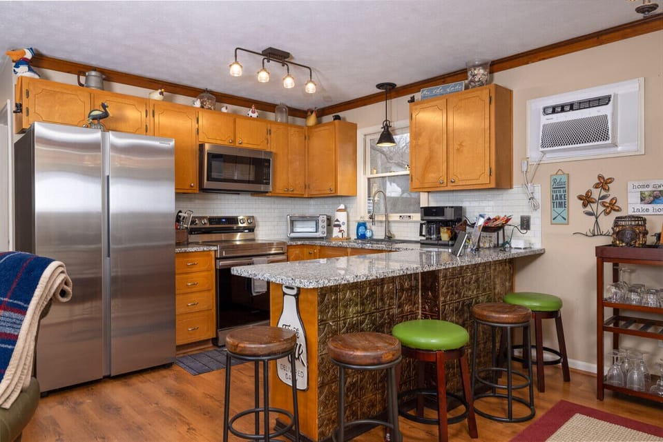 Our fully equipped kitchen is a chef`s dream, with bar stool seating, dual coffee makers, and all the amenities needed to whip up tasty treats.